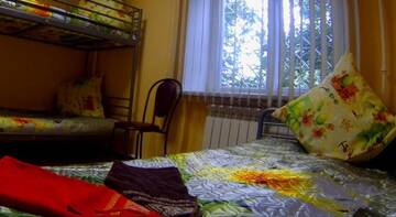 Фото номера Спальное место на двухъярусной кровати в общем номере для мужчин и женщин Мини-отель  Солнце и Луна г. Осташков 4